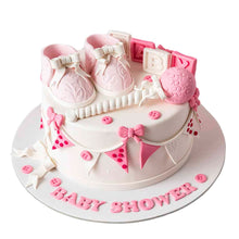 Pink shoes and rattle cake