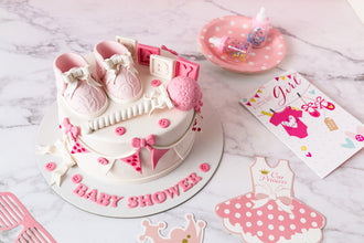 Pink shoes and rattle cake